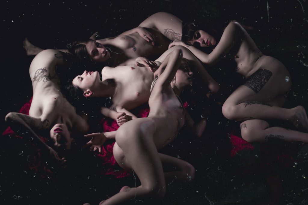 Artwork where there are five women laying down. Dark Aesthetic Photography